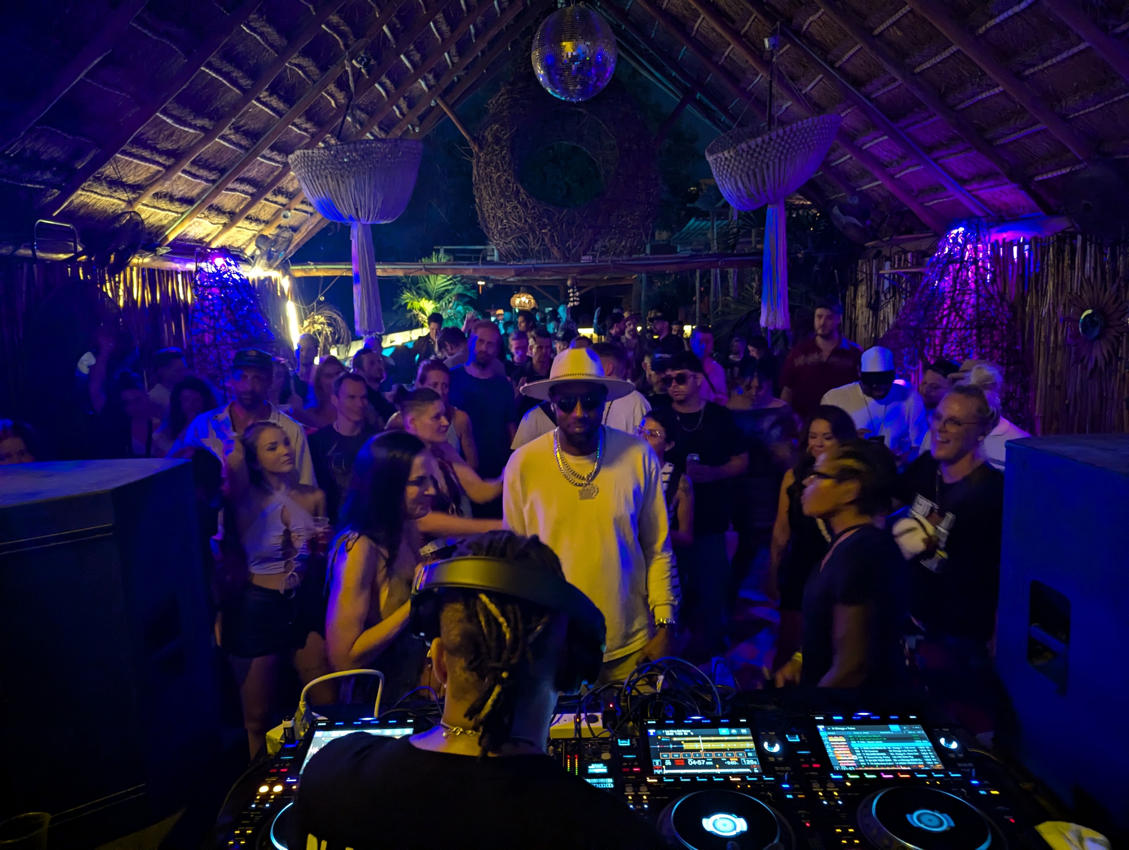 DJ booth with Green Velvet and crowd at Destination Unknown